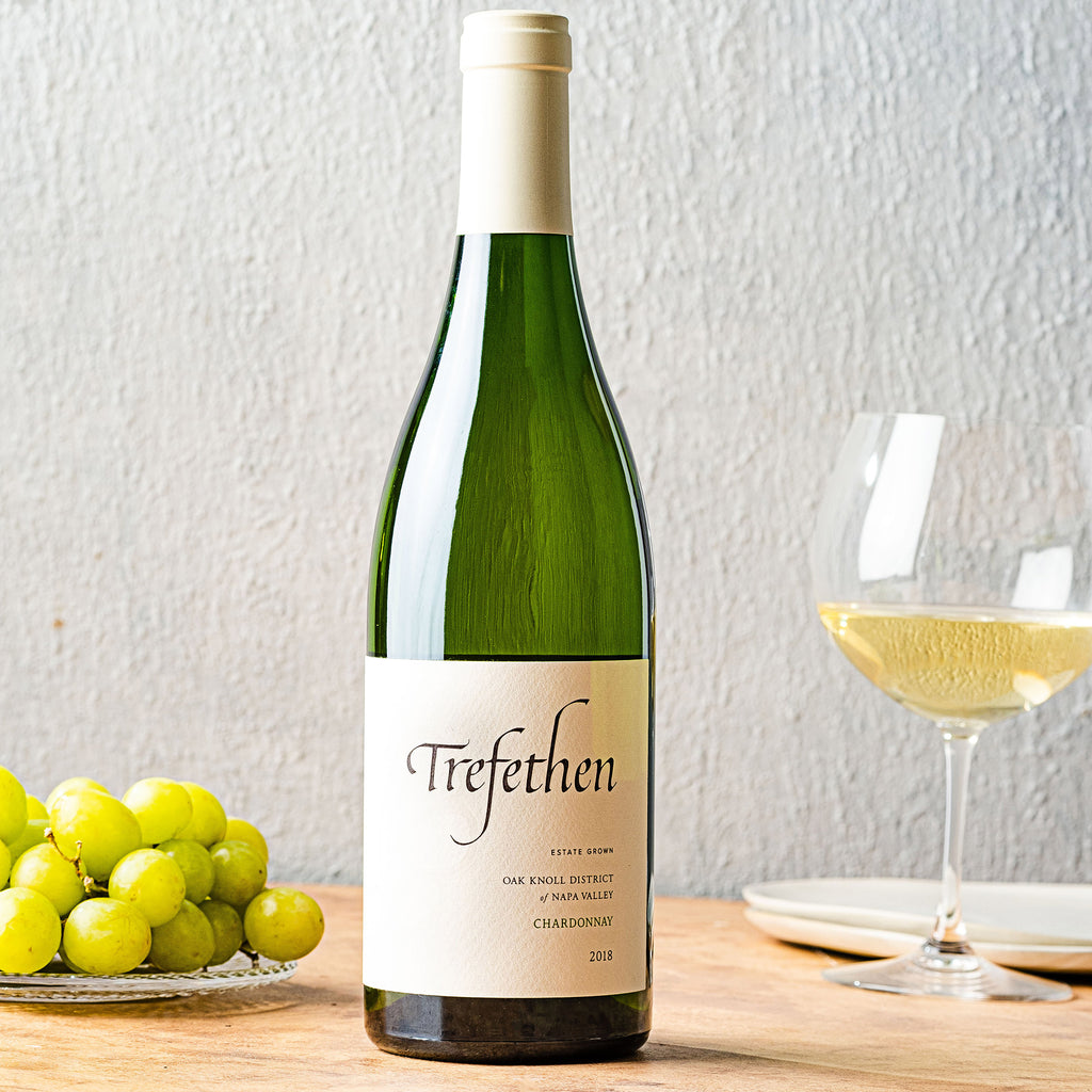 A bottle of Trefethen Chardonnay 2018 in 750ml with glasses