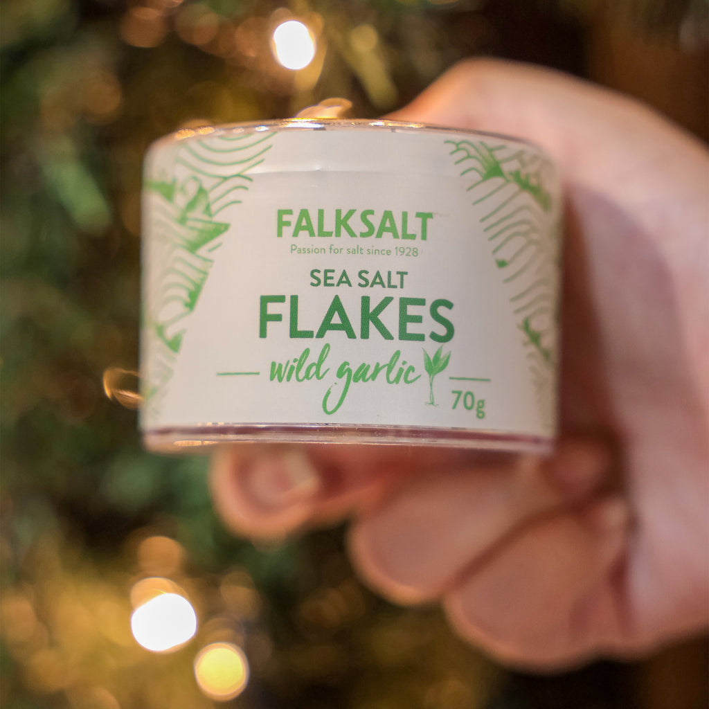 A can of premium Falksalt Wild Garlic Sea Salt Flakes in 70 grams, label