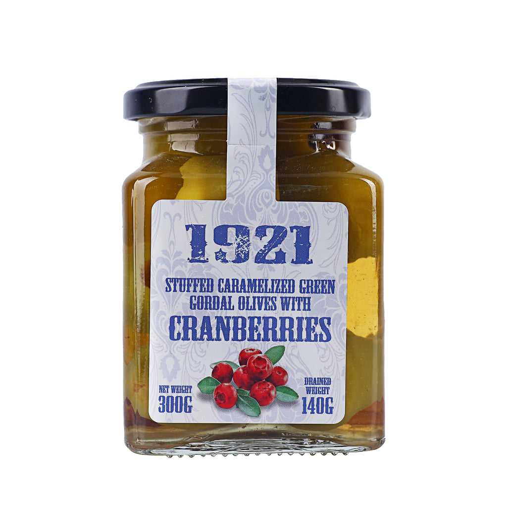 A jar or 1921 Stuffed Caramelized Green Gordal Olives with Cranberries in 300 grams