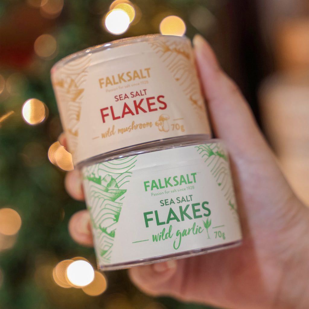 A can of Falksalt Rosemary Sea Salt Flakes in 70 grams, with another premium variant